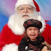 kid screaming on santas lap