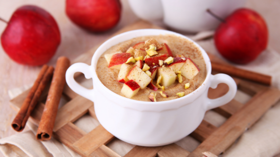 Cinnamon Apple Oatmeal next to apples