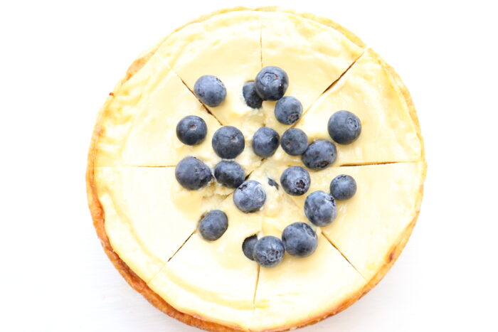 top view of weight watchers cheesecake topped with blueberries ready to eat