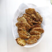 air fryer zucchini chips in a white bowl
