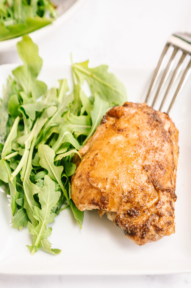 closeup of air fryer fried chicken with fork