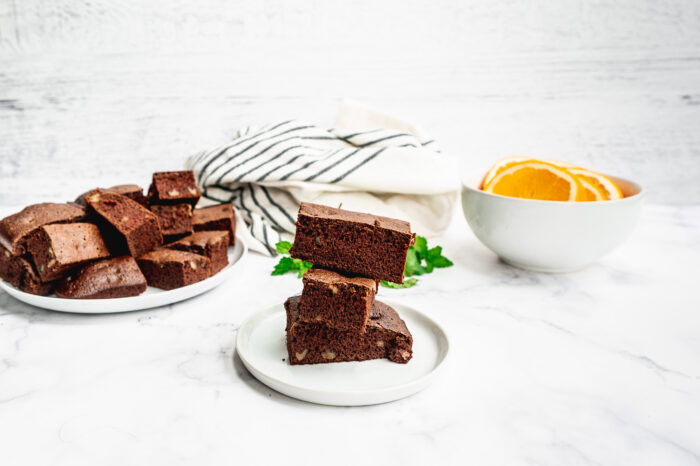 a stack of weight watchers chocolate cake bites on a white plate 