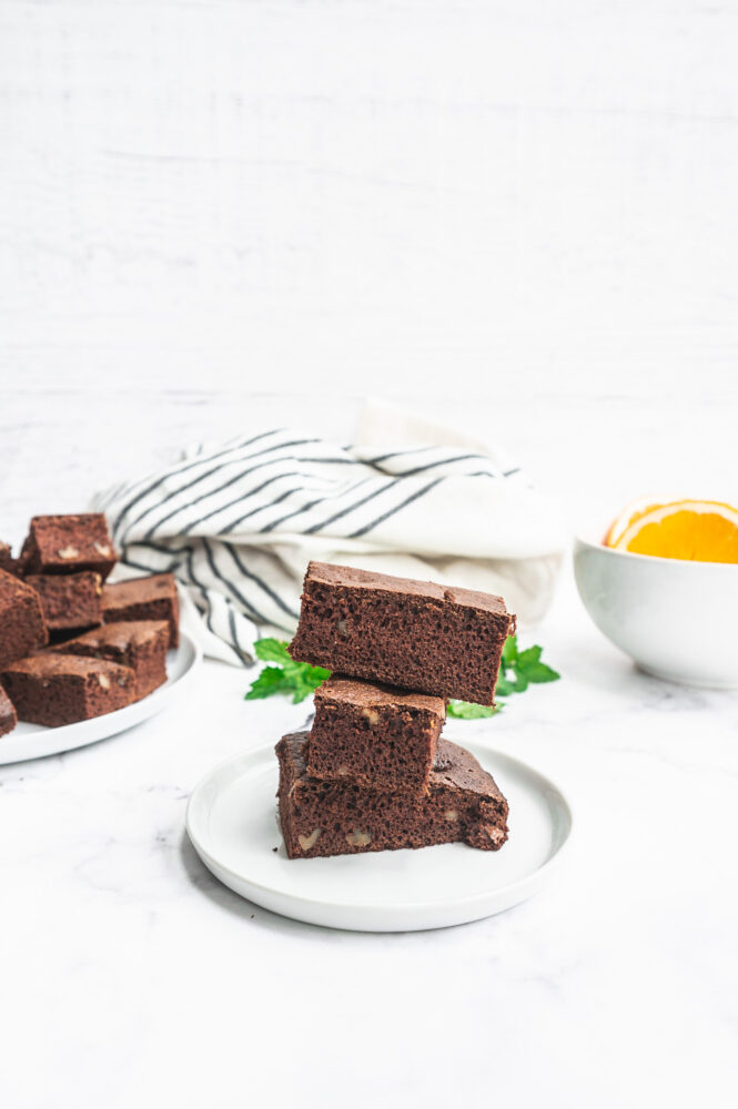 close up of chocolate cake bites on a white plate