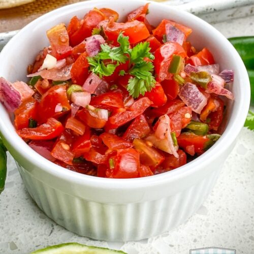 homemade pico de gallo without jalapeños in white ramekin