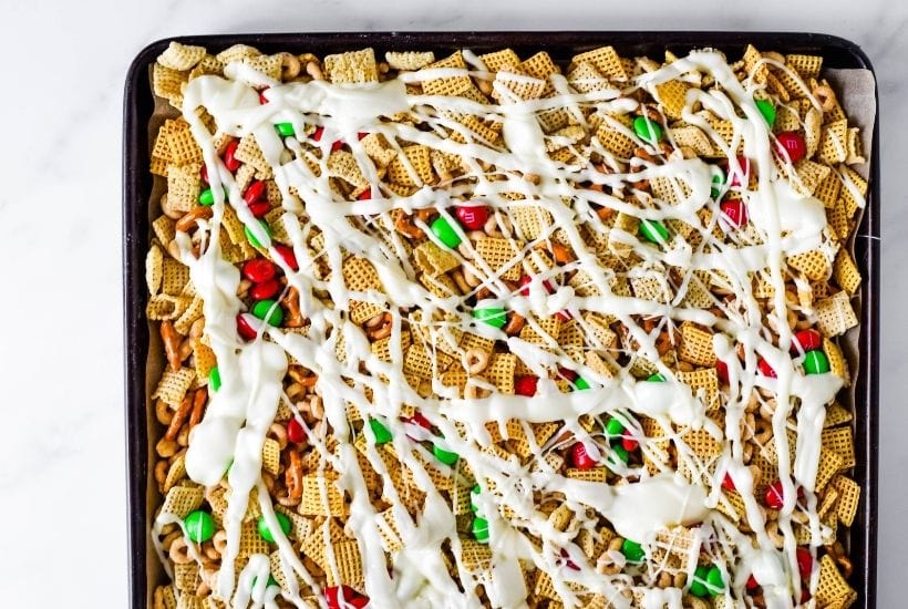 top shot of white chocolate chex mix on a baking sheet